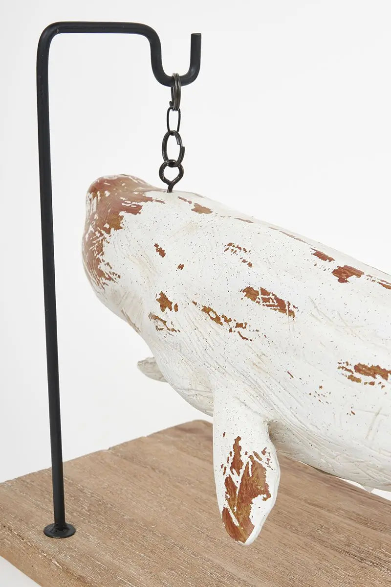 Large whale with wooden base