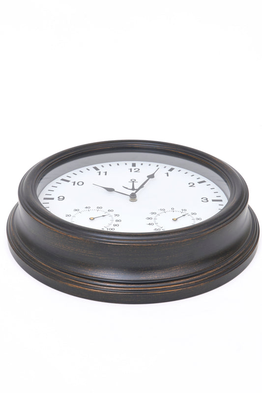 Reloj de pared con termómetro y detalle de ancla