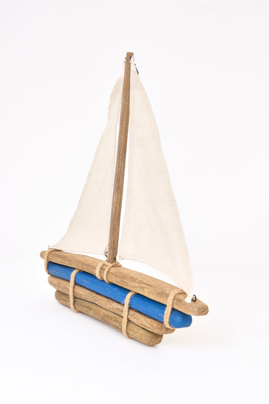 Wooden sailboat with fabric sail