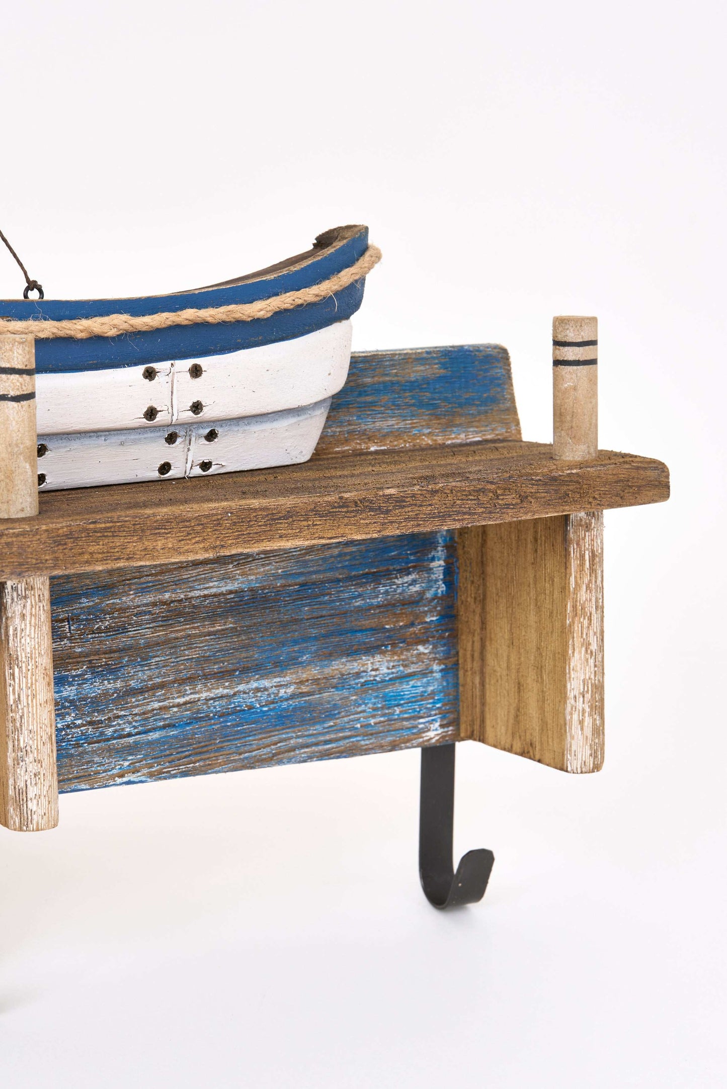 Wooden boat-shaped coat rack