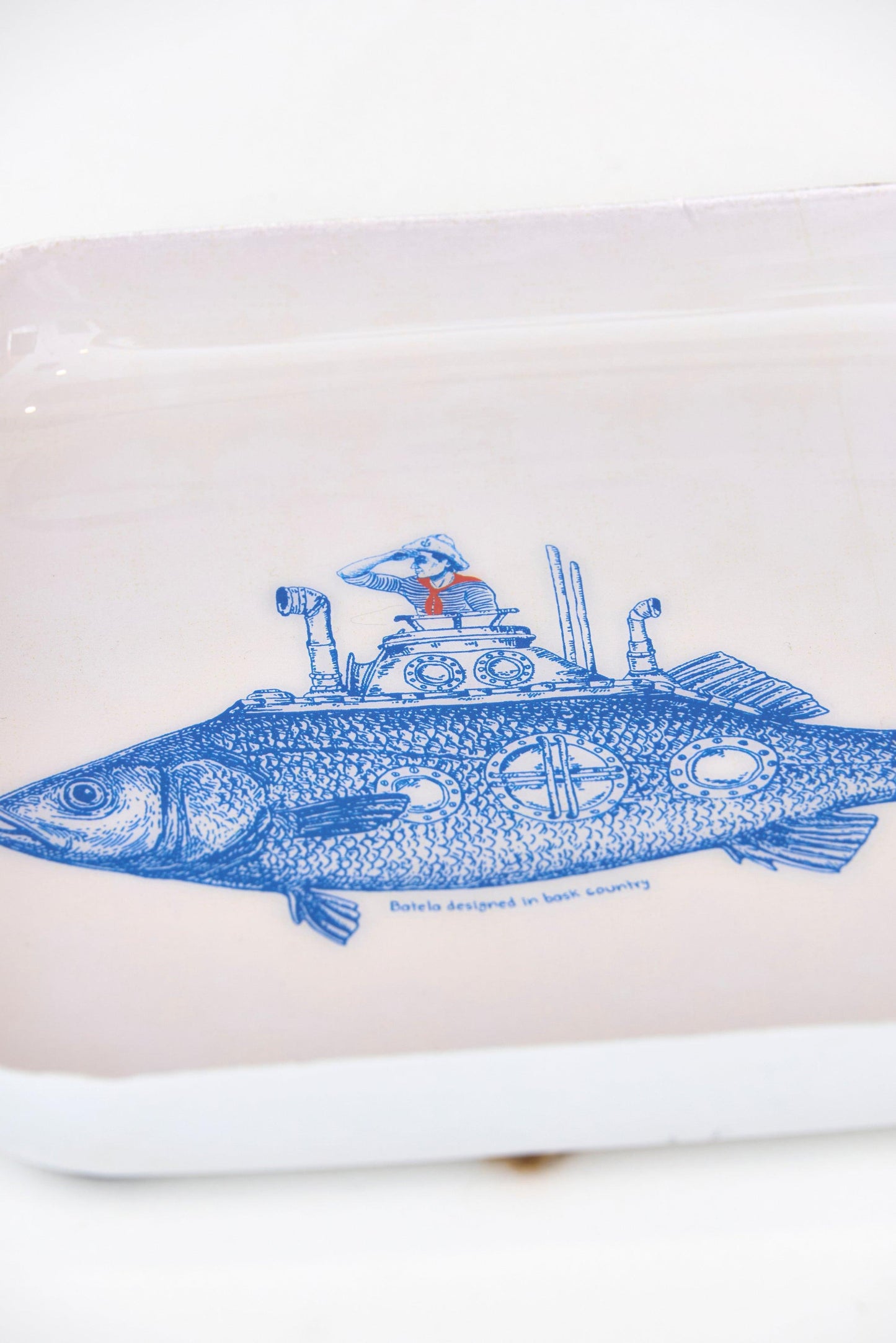 Metal tray with illustrated underwater fish