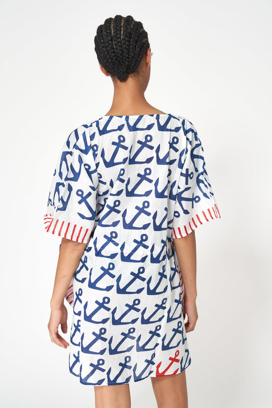 Anchor poncho with nautical aesthetic