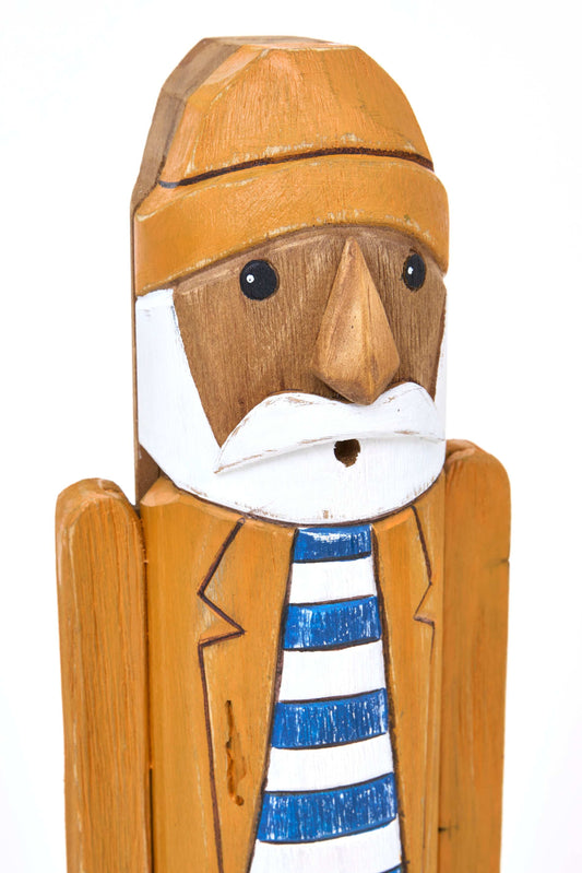 Marinero decorativo de madera con chubasquero