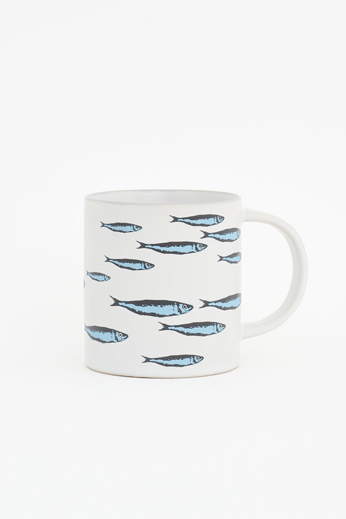 Mug o taza en cerámica con banco de peces