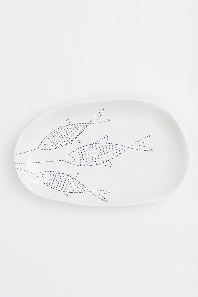 Plato con peces en porcelana blanca grande